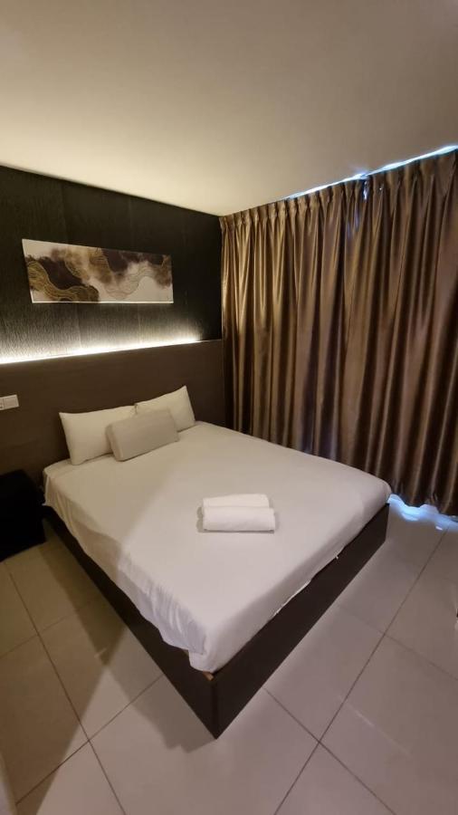 One Point Hotel Кучинг Экстерьер фото